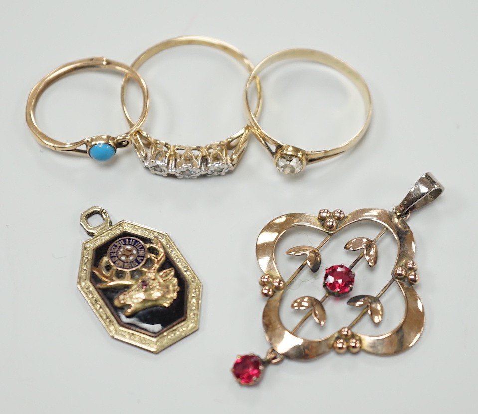 A yellow metal and old mine cut solitaire diamond set ring, size N, gross 1.1 grams, a 9ct gold and three stone diamond chip set ring, a yellow metal and turquoise set earring, an enamelled pendant and a 9ct and gem set